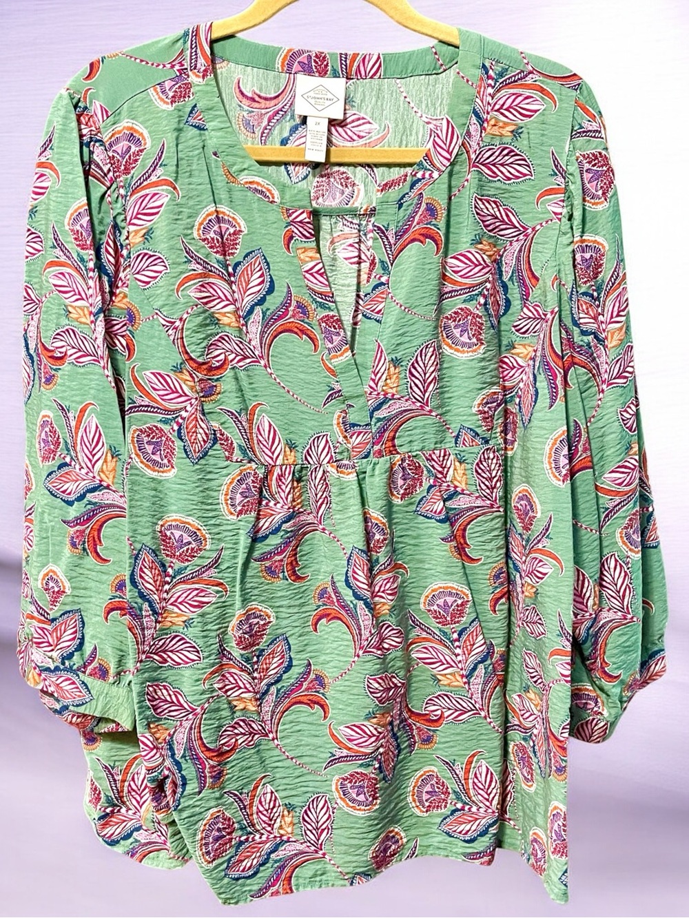 Woman’s St John’s Bay green flutter sleeve blouse